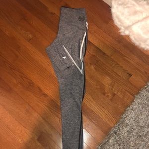 Gray leggings with stripes down the legs